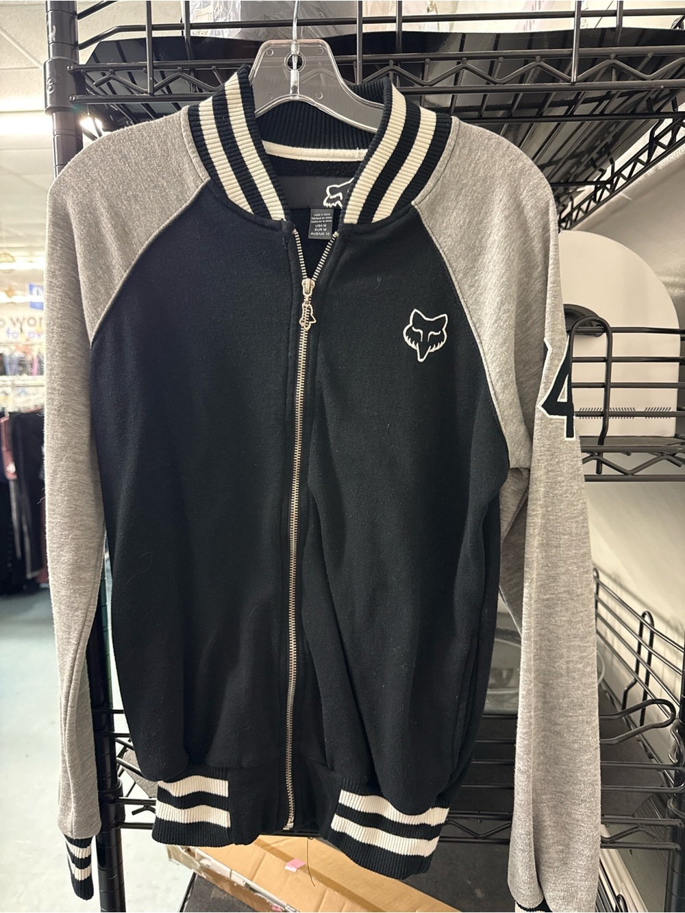 Fox Black Jacket with Gray Raglan Sleeves and Striped Trim